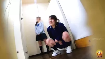 EE-706 04 Pee emergency by schoolgirls in line in front of the toilet