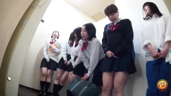 EE-764 05 Hidden camera inside high school. Girls line up and pee.