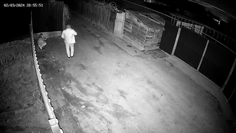 CCTV - She pissing under our fence!