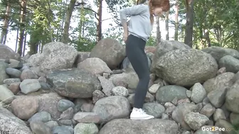 Redhead On The Rocks